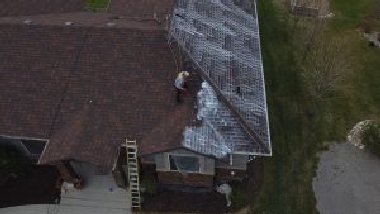Tacoma roof restoration team in WA near 98404